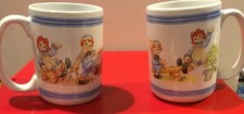 Raggedy Ann  Andy Doll CUPS MUGS Outside Playing 12 oz  31920