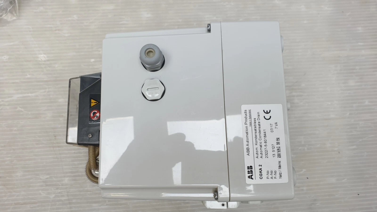 Side of the ABB CGKA 2 with cable glands and rating label