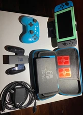 Nintendo Switch (2017) (USED)  W/ Accessories (controller, case, charger)