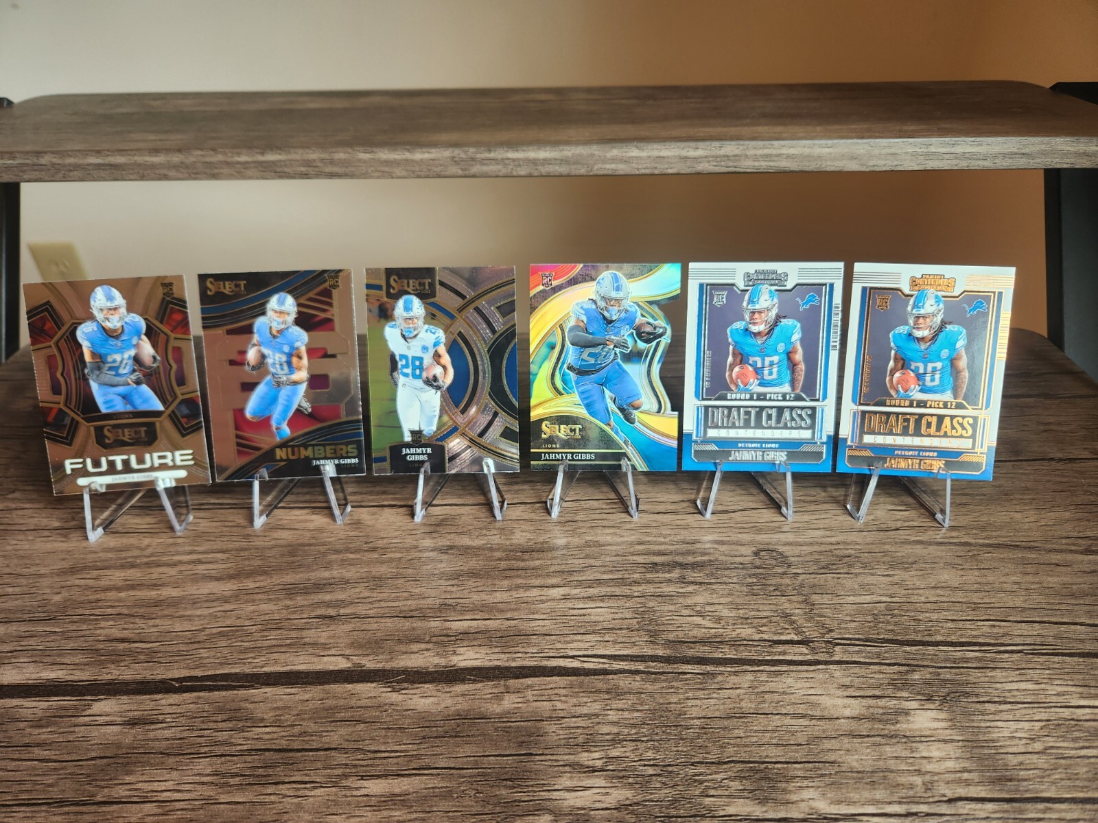 2023 Select Jahmyr Gibbs Club Level Red Yellow Die Cut, Future, Numbers Lions