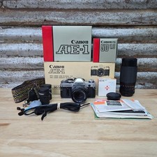 Canon AE-1 35mm Film Camera FD 50 mm 1.8 Lens Original Boxes Bundle Extras