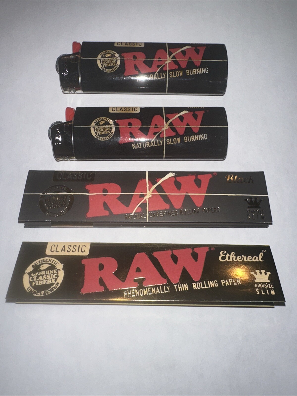 2 Packs RAW Black Classic KING SIZE & Ethereal Papers & 2 Raw Bic Lighters