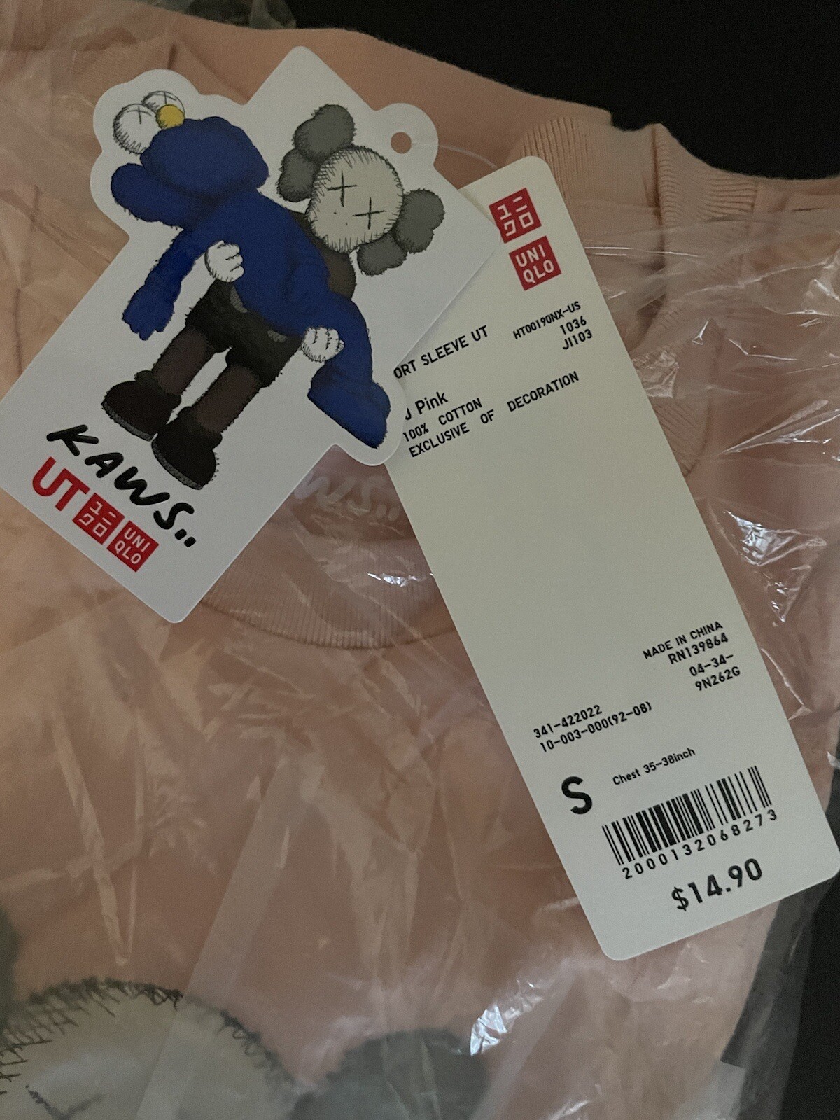 ALTRA Maglietta rosa KAWS x Uniqlo Companion taglia small nuovissima