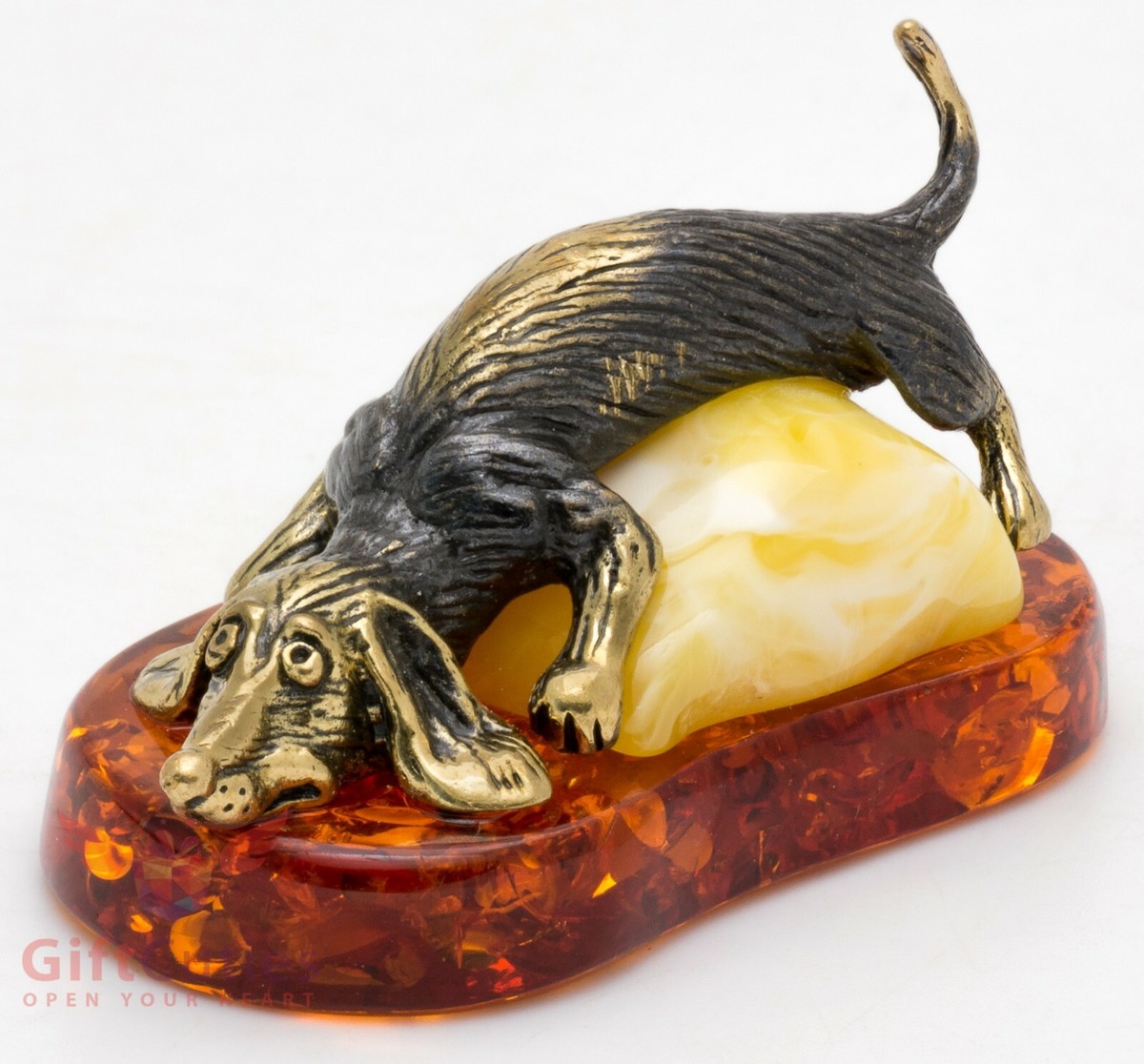 Solid Brass Amber Figurine of lazy Dachshund on a pillow Dog