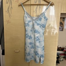 baby blue dress size M , with a printed floral pattern