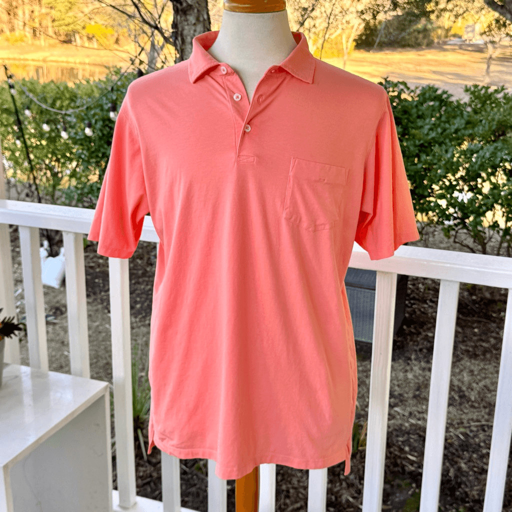 B. Braddy Coral Pocket Polo Shirt. Large.