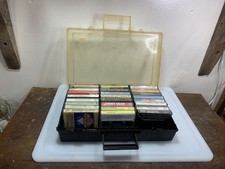 lot of 24 cassette tapes with case