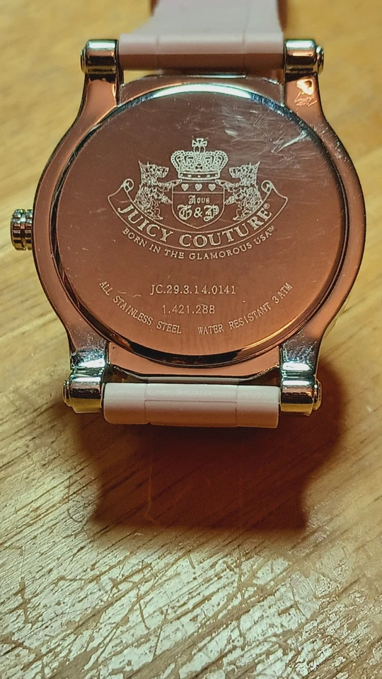 Caja de acero inoxidable para mujer Juicy Couture bisel naranja rosa correa de PU 3 manos Foto 3 de 4