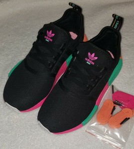 adidas originals nmd sneakers in black and pink