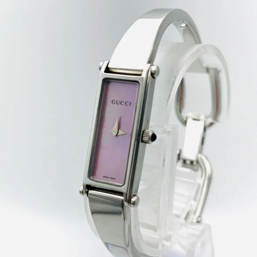 Montre femme vintage GUCCI 1500L coquille rose quartz argent du Japon quasi neuve