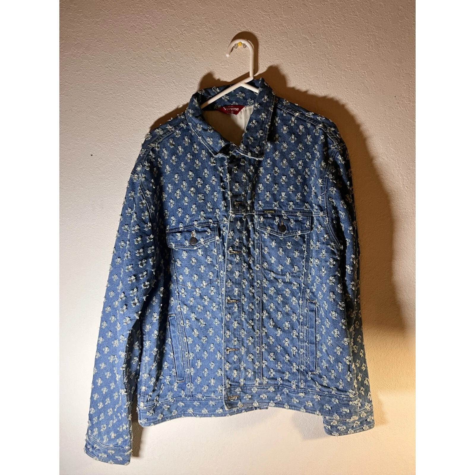 veste camionneur en denim perforé trou suprême