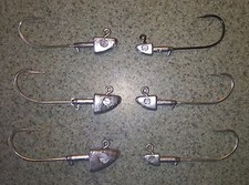 10 pack Barbed SHAD HEAD JIGS 8/0 Hook Unpainted 1/2oz to 2oz T&A JIG HEADS