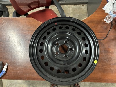 OEM Nissan 17x7J SteelWheelRim DOT TOPY 4BA0B Black Factory Spare or Replacement