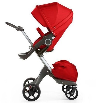 stokke xplory red stroller includes bassinet never used. Including winter kit