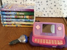 Sistema de aprendizaje táctil VTech MobiGo rosa púrpura con 6 cartuchos de juego y enchufe de coche
