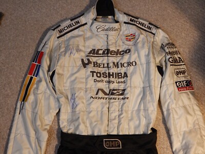 WAYNE TAYLOR & MAX ANGELELLI HAND SIGNED CADILLAC RACING, OMP DRIVER'S SUIT