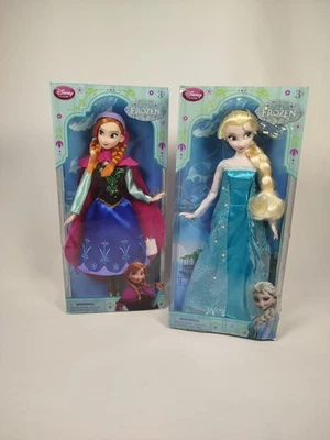 lot de 2 poupées LA REINE DES NEIGES Elsa et Anna Disney store neuves - Photo 1/4