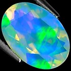 2.07 Ct Natural Ethiopian Faceted Opal Gemstone Multi Color Oval Cut — photo 2