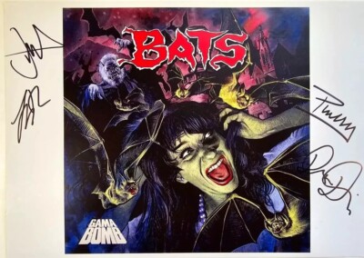 Gama Bomb HAND Signed presentation size A4 on glossy print by Band Members