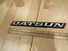 Vintage Datsun Original Plastic Emblem Oem