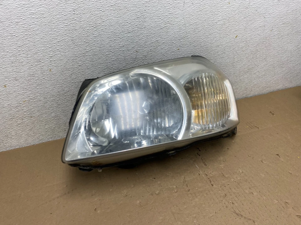 Faro halógeno izquierdo conductor Mazda Tribute 2005-2006 OEM N2283 DW Foto 3 de 4