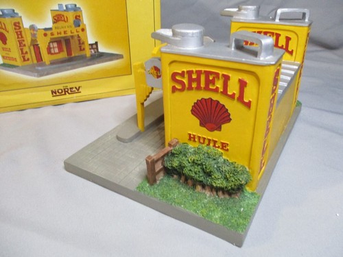 AV397 NOREV 1/43 STATION SERVICE SHELL RELAIS N°5 1998 RESINE FORME BIDON HUILE - Imagen 8 de 14