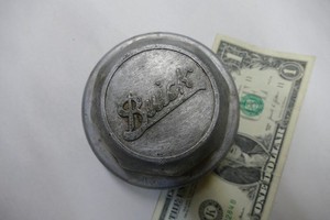 Antique automobile hubcap 1920s Buick grease cap 4 inch diameter aluminum