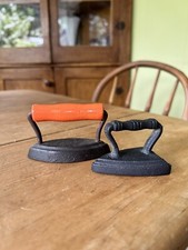 2 VINTAGE CHILD’s IRONS Cast Iron Metal SAD IRONS~ORANGE WOOD HANDLE*KID’S TOYS*