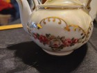 Vintage hand painted porcelain miniature Teapot iridescent floral w/ gold accent — photo 2