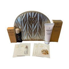 Cle De Peau 7 Piece Set Beaute Sample Set with Gold Bag