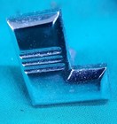 <!--F#f_0--> Holden FX Business Special Genuine “L” Bonnet Boot Lid Letter Badge NOS<!--F/-->