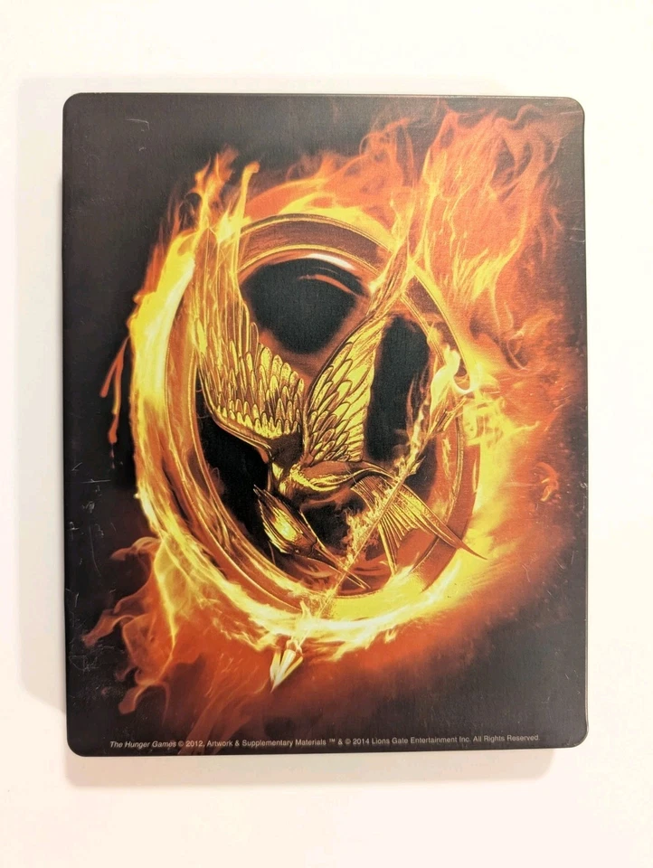 The Hunger Games, Catching Fire, Mockingjay Part 1 Steelbook Best Buy Exclusive Foto 3 de 4