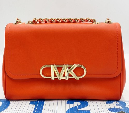 Michael Kors Umhängetasche orange Leder 2-Wege Crossbody Klappe fast neuwertig