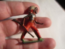 VINTAGE INDIAN METAL TOY FIGURE 2" TALL MADE IN ENGLAND - OFC-18