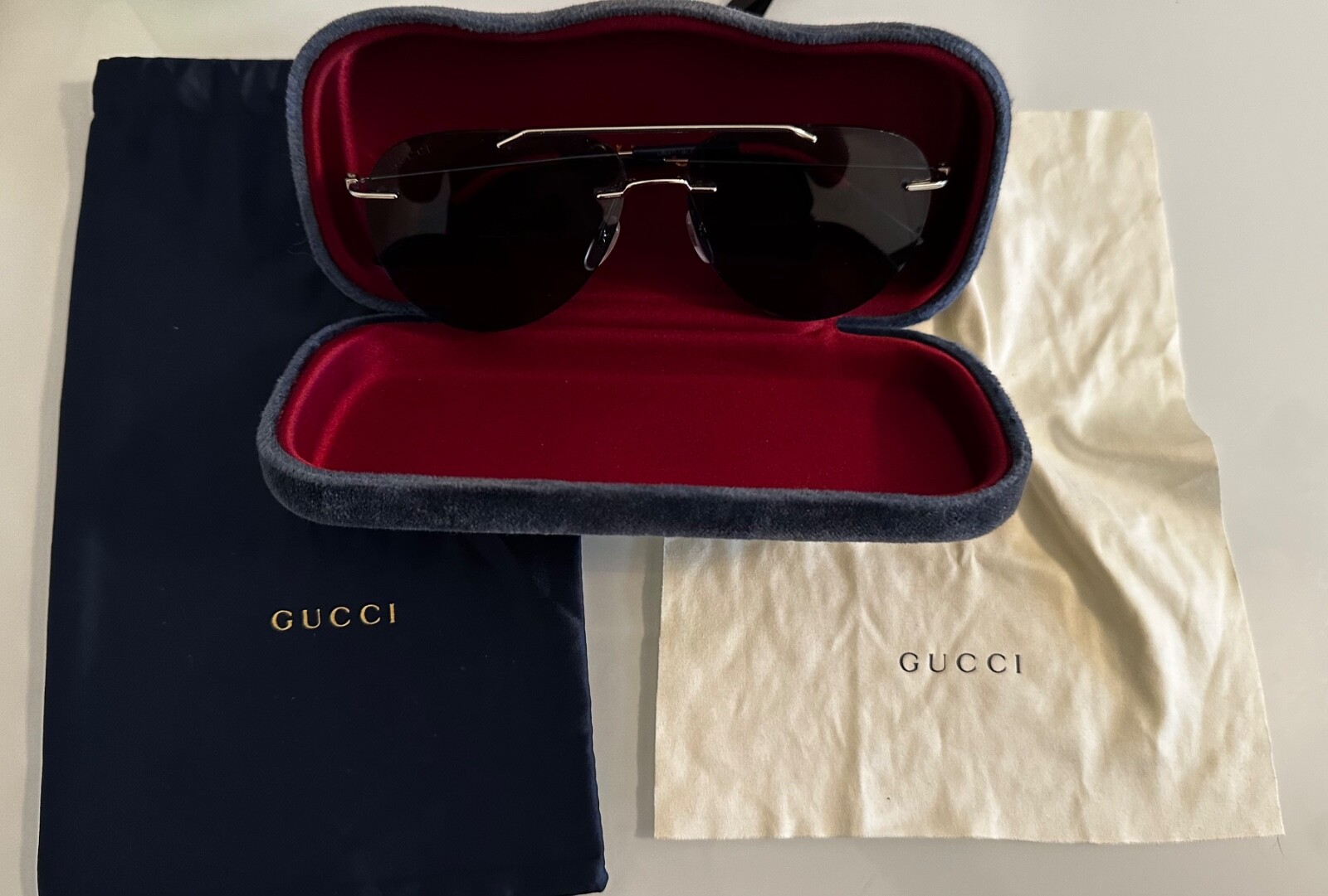 Gucci GG0397S-006 aviator sunglasses with minor lens scratches-image