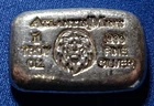 A Atlantis Mint LION- 1 oz .999 Fine Silver Hand Poured Bar