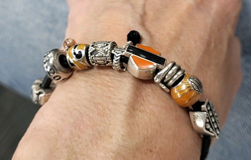 RARE PANDORA BRAIDED LEATHER BRACELET WITH 8 GENUINE HARLEY DAVIDSON CHARMS
