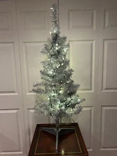 Silver Christmas tree 4ft by Everstar with lights.