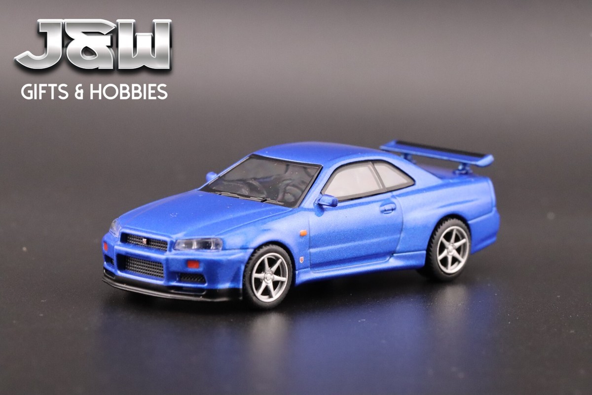 Mini GT Nissan Skyline. GT-R (R34) V-Spec Bayside Blue #759 1/64