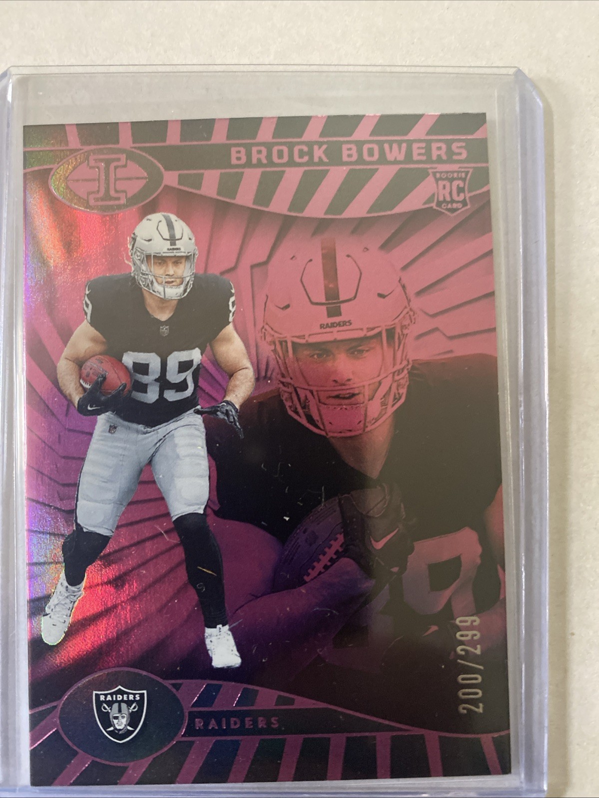 2024 Panini Illusions - Brock Bowers #47 Trophy Collection Pink /299 (RC)