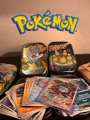 Pokémon  Box   50 Karten pro Tin   5 Seltene garantiert!