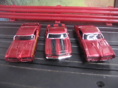 Aurora Model Motoring T-Jet NEW  Bodies  Red GTO's and Camaro  with minor flaws.