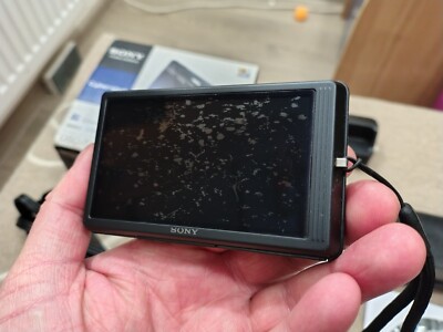 Sony Cyber-shot DSC-TX7 10.2MP Digital Camera - Black Fully