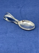 INTERNATIONAL SILVER CIE STERLING BABY BENT SPOON 