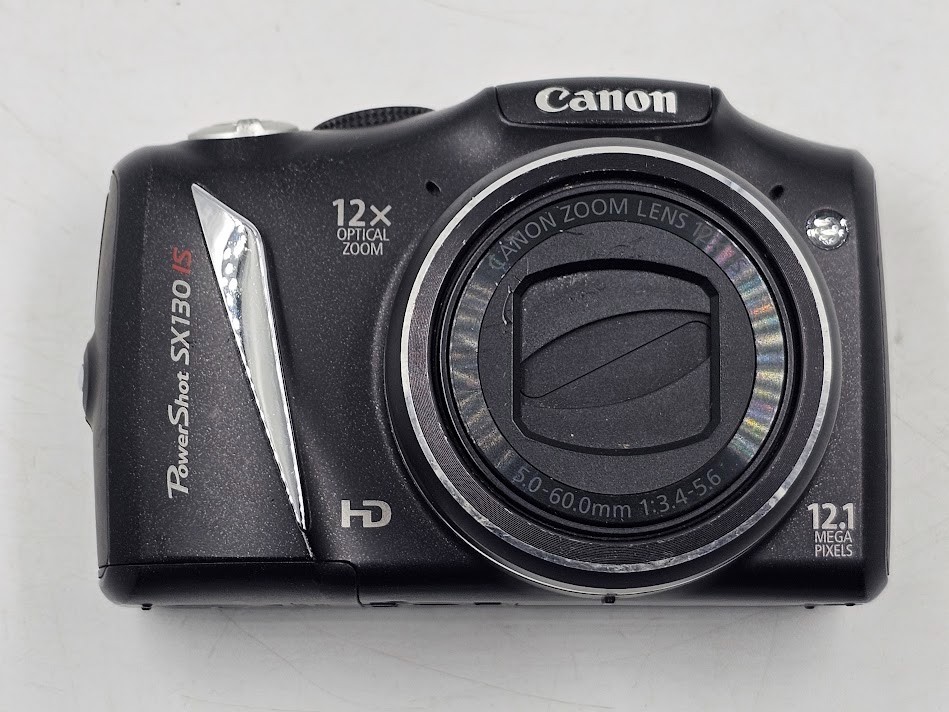 Canon SX130 IS 12.1 MP Digital Camera Black - Working