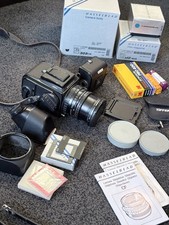 Hasselblad 503CW - CFi 60MM - 2 film backs and many accessories.
