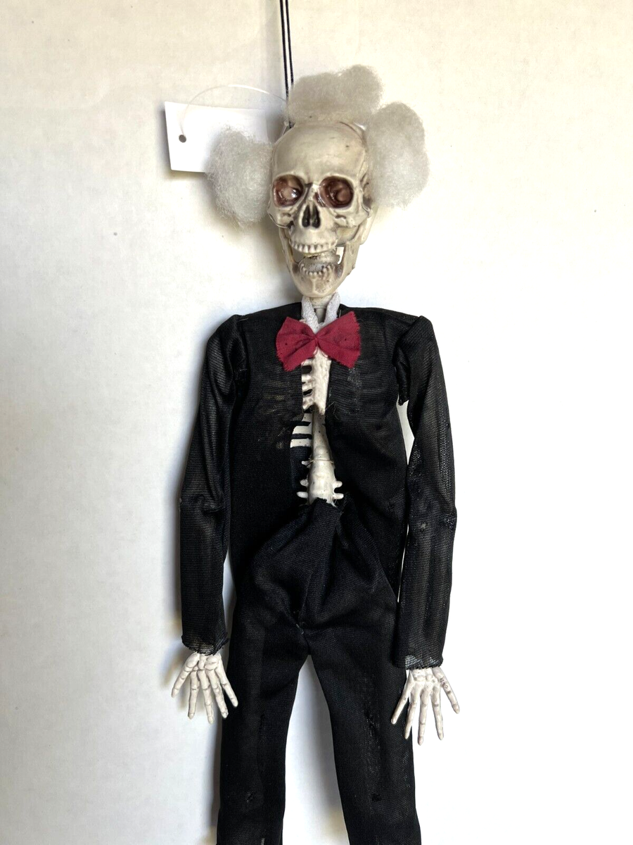 skeleton with bow tie