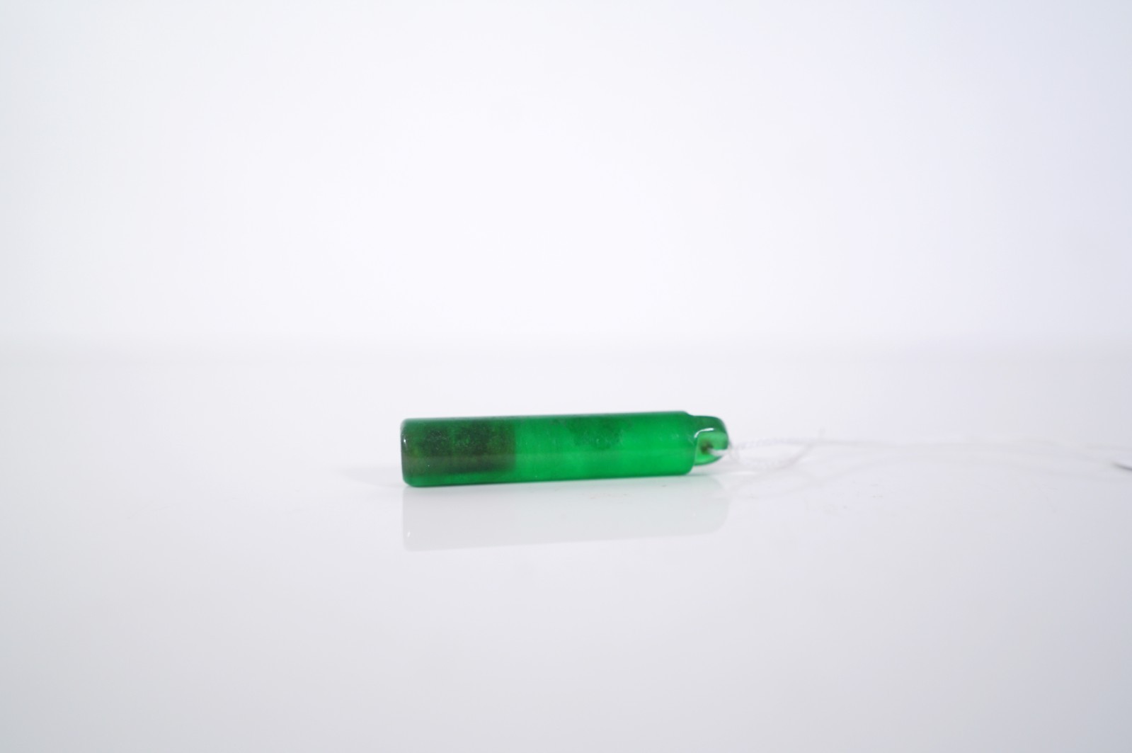A Green Quartz Stone Tube Pendant