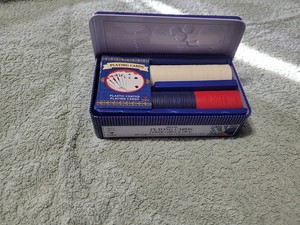 Poker game set with playing cards and chips in a nice little tin. Vintage game 
