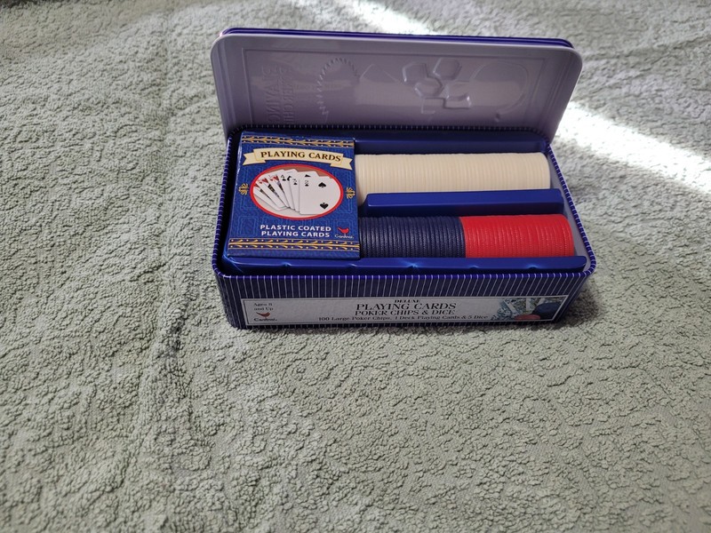Poker game set with playing cards and chips in a nice little tin. Vintage game 